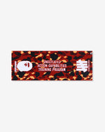 RED::A red towel printed with black and yellow camo. The words 'A Bathing Ape Athletic Club Training Program' is printed in white on the middle. The Bape head icon is printed on the left of the towel with the word 'Undefeated' printed below it. The Undefeated 5-strike icon is printed on the right of the towel with the words 'A Bathing Ape' below the icon.