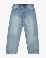 LIGHT BLUE::A light blue Undefeated Selvedge Baggy Denim Pant on a white background.